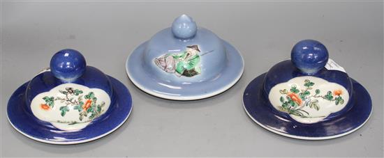 Three Chinese blue ground covers, late 19th century, including a pair with famille verte reserves, diameter approx. 17cm, internal rim